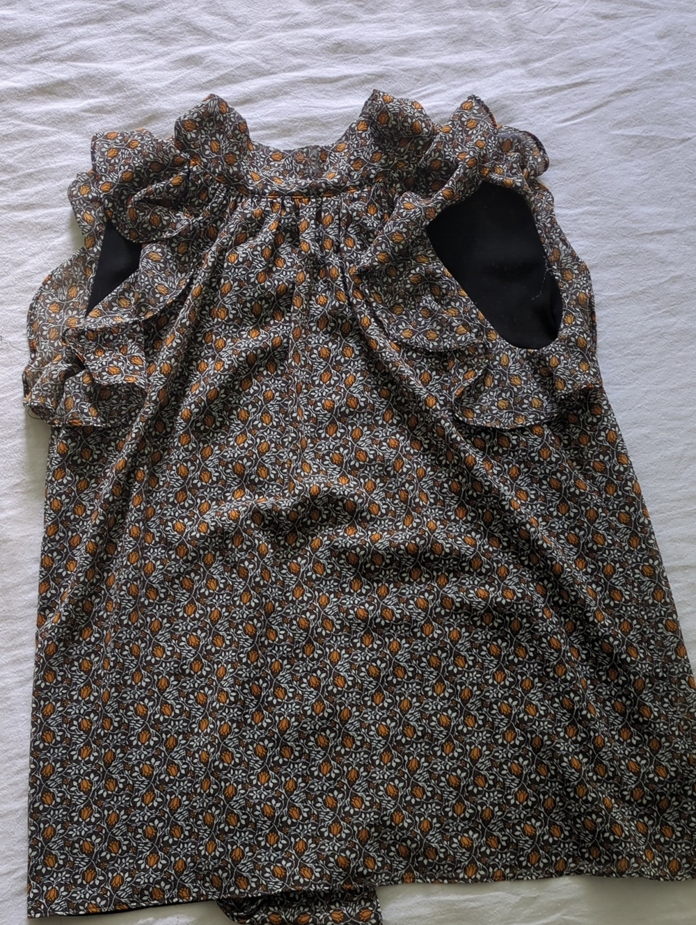 Sleeveless Top Ties At Back